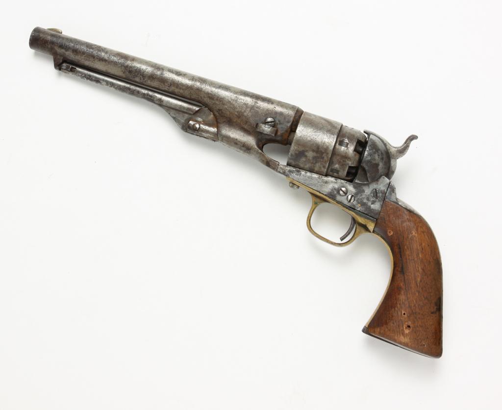 COLT NAVY MODEL 1851 SIX-SHOT REVOLVER.: American, ca. 1855. Octagonal barrel, steel barrel and frame, walnut grips, brass accents, and faint naval battle scene on cylinder. Barrel length 8", 13.25"l. overall. Wear, holes in grip, dents and 