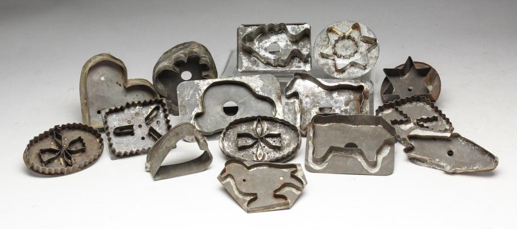 AMERICAN TIN COOKIE CUTTERS.: Early 20th century. Includes animals, hearts, stars and shapes. Fifteen pieces. Some missing handles.