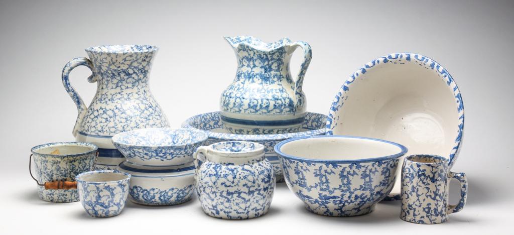 GROUP OF AMERICAN SPONGEWARE.: Ca. 1900. Pitcher and bowl. Spout-less water jug, cracked. Two bowls. Cuspidor. Bean pot. Mug. Spouted pot with bale handle. And cup. Some wear and chips. 12.5" to 3"h.