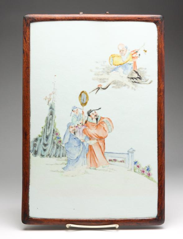 CHINESE PORCELAIN PLAQUE.: Second half 19th century. Delicately hand decorated image of robed figures and a deity on a crane. Orange peel glaze. In wooden frame, 16"h. 10.75"w.