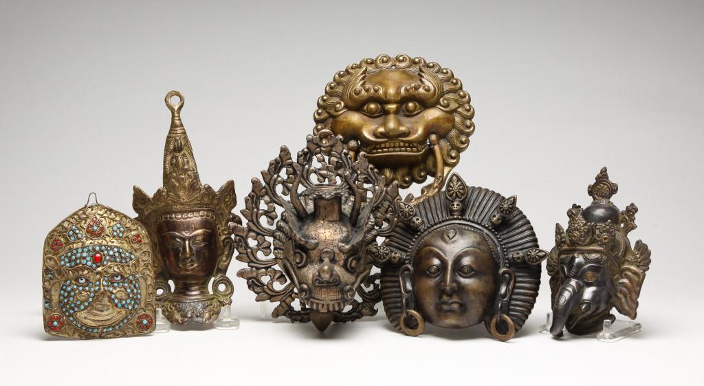 SIX EASTERN METAL FIGURAL PLAQUES. (1 of 6)