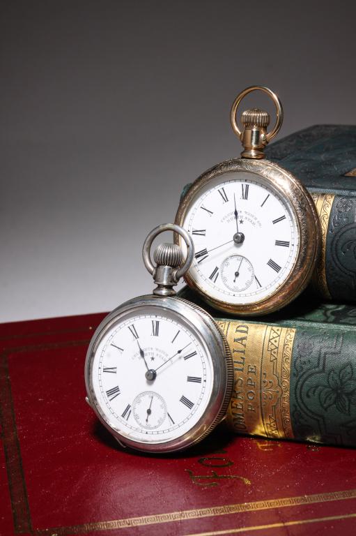 TWO COLUMBUS WATCH CO. NORTH STAR WATCHES.: American, late 19th century. Two OF watches, both 18S, SW & set, 11J with 'North Star' on dial and North * on movement. One Keystone coin silver case, engraved with wear, small hairlines on dial, seri