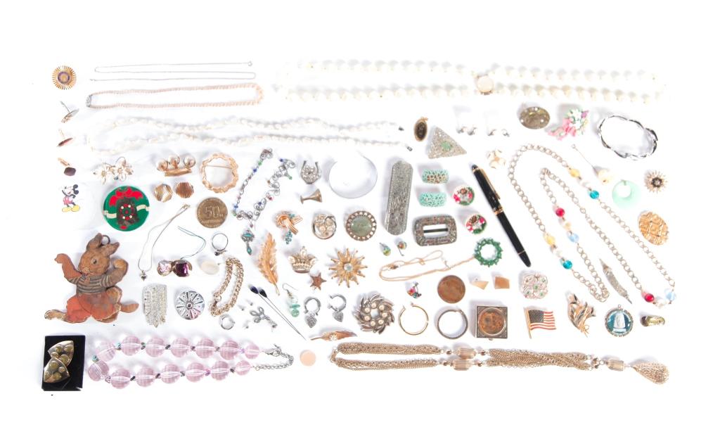 GROUP OF VINTAGE COSTUME JEWELRY.: Mid-late 20th century. Assortment of vintage costume jewelry comprised of earrings, bracelets, pins, and more. Marked pieces by Coro, Sarah Cov and Avon. Some pieces may need minor repairs.