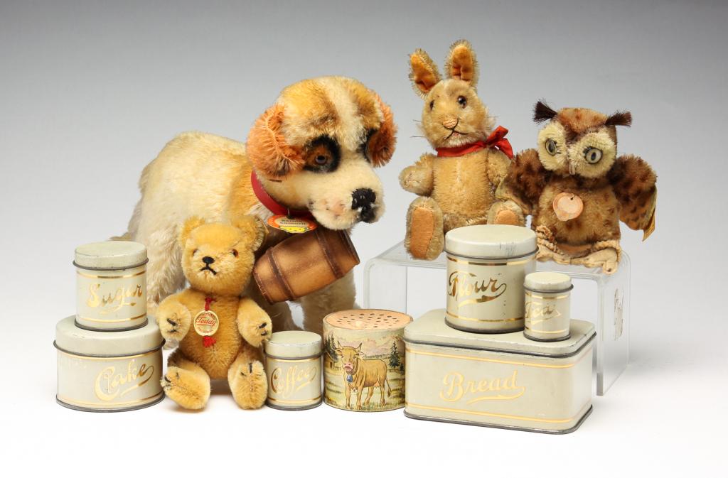 GROUPING OF TOYS INCLUDING STEIFF.: Twentieth century. Including Steiff owl and "Bernie Samarit" dog, small kitchen tins, Hermann "Teddy" and mohair bunny. Varying wear.
