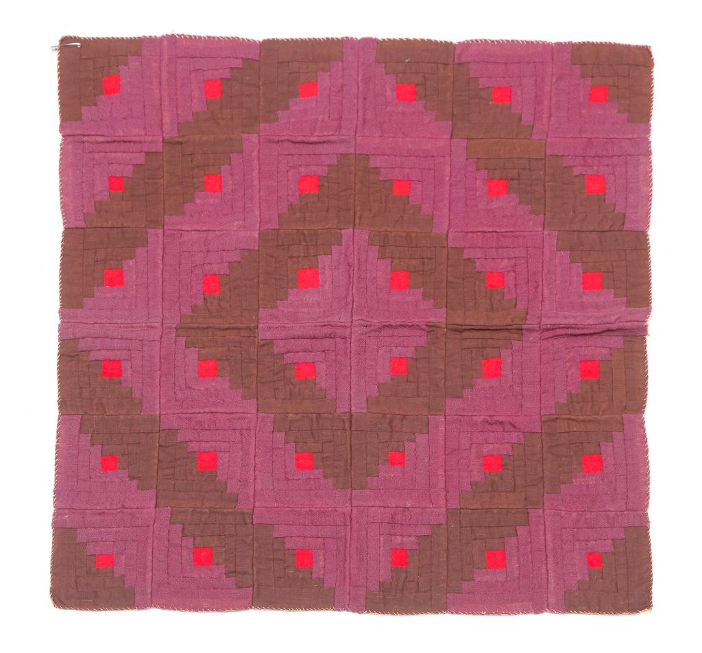 AMERICAN PIECED CRIB QUILT.: Late 19th century. Hand stitched Log Cabin Sunshine and Shadows quilt in purple and brown. Stained back. 19.5" x 19.5".