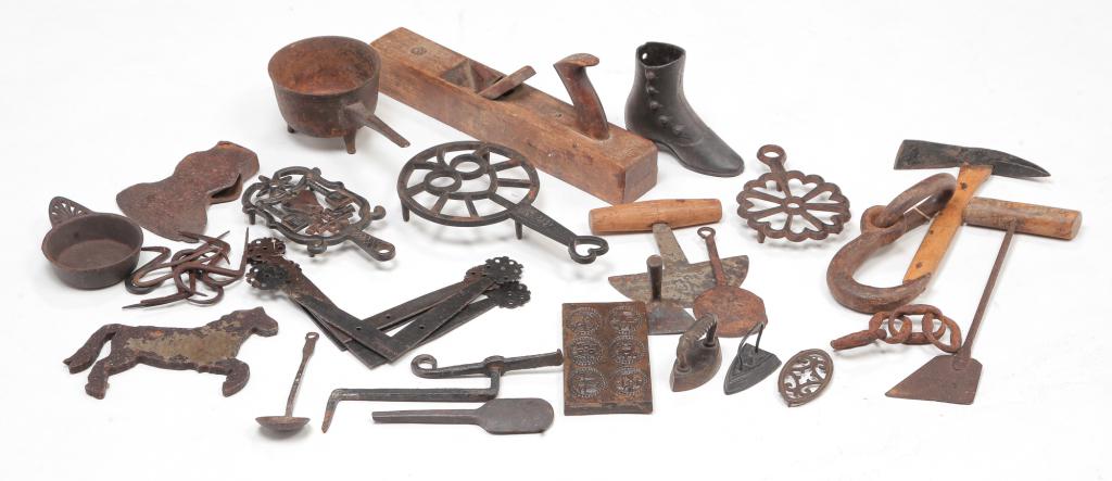 GROUP OF ASSORTED IRON AND WOODEN ITEMS.: Nineteenth and 20th centuries. Including block plane, trivets, miniature irons, shoe match holder, pots, braces, axes and hatchet and etc.