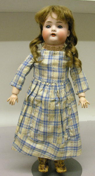 BRUNO SCHMIDT, 20". Bisque socket head marked: "BS: BRUNO SCHMIDT, 20". Bisque socket head marked: "BS" over "W" inside heart. Blue sleep eyes, open mouth, brown human hair wig, fully jointed composition body with original finish and stamped "made in G