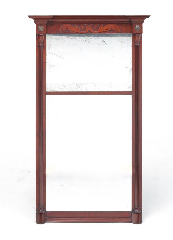 AMERICAN FEDERAL PERIOD MIRROR.: First quarter 19th century, mahogany. Stepped cove-molded cornice, leaf bracket frieze, half reeded pilasters and brass rosettes. Refinished, replaced back board and mirror has some foxing. 42"h. 23.7