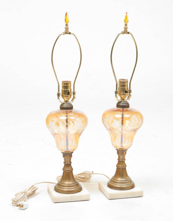 PAIR OF AMERICAN OIL LAMPS.: Second half 19th century. Amber flashed cut to clear fonts, brass columns and white marble bases. Bases have small flakes. Electrified, 12.25"h. to collar.