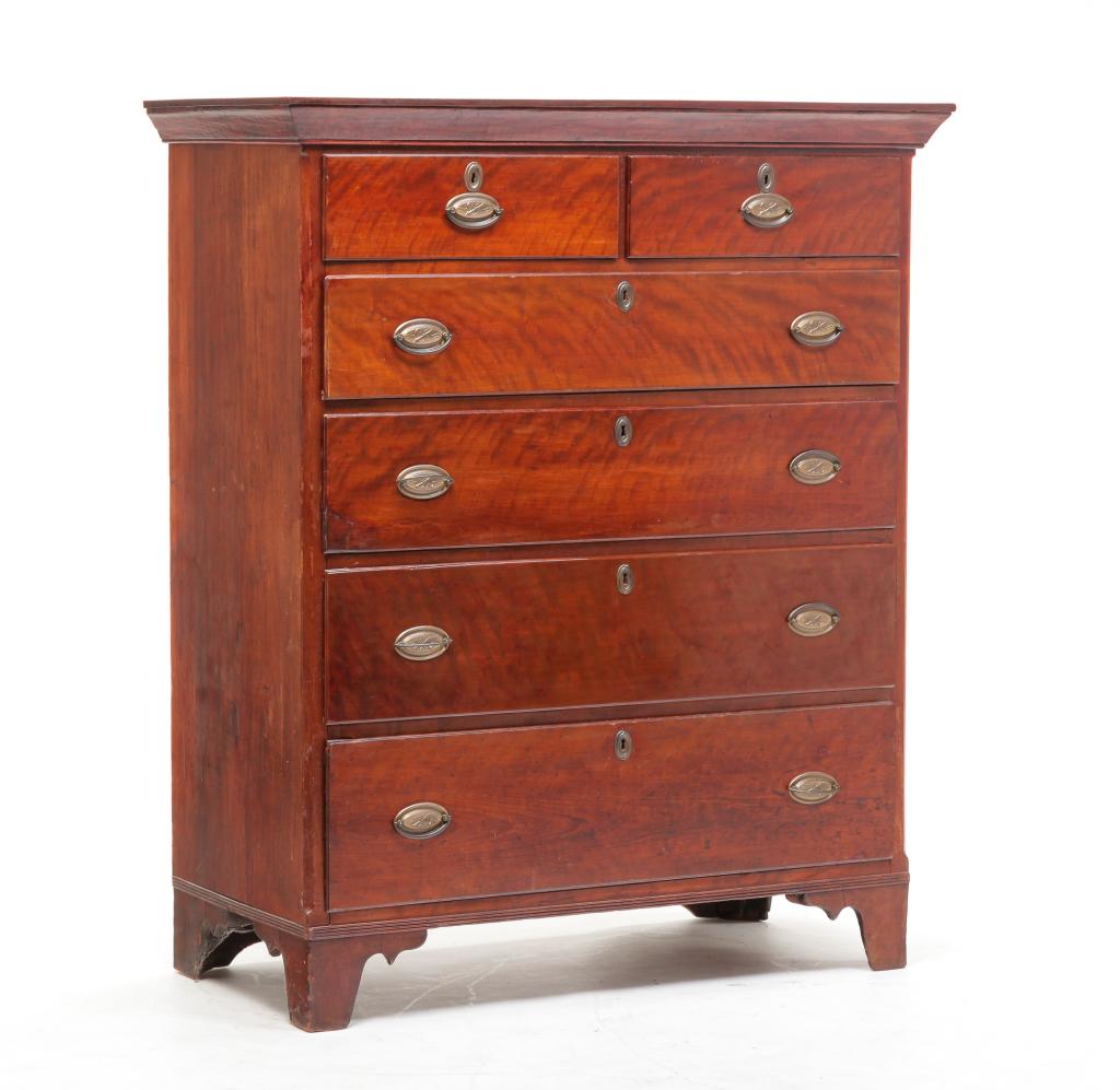 AMERICAN HEPPLEWHITE TALL CHEST.: Fourth quarter 18th century, figured cherry with pine and poplar secondary. Rosehead and square nail construction. Two over four dovetailed drawers with replaced brasses, bracket, not quite French, fe