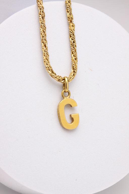 14K GOLD CHAIN WITH 18K GOLD 'G' PENDANT.: Italian, early 21st century. 18"L fancy gold chain, approx, 2mm thick, box clasp stamped 'Italy 585', weight 14gr. Together with initial 'G' pendant, stamped 'Gucci 18K', weight 4gr.