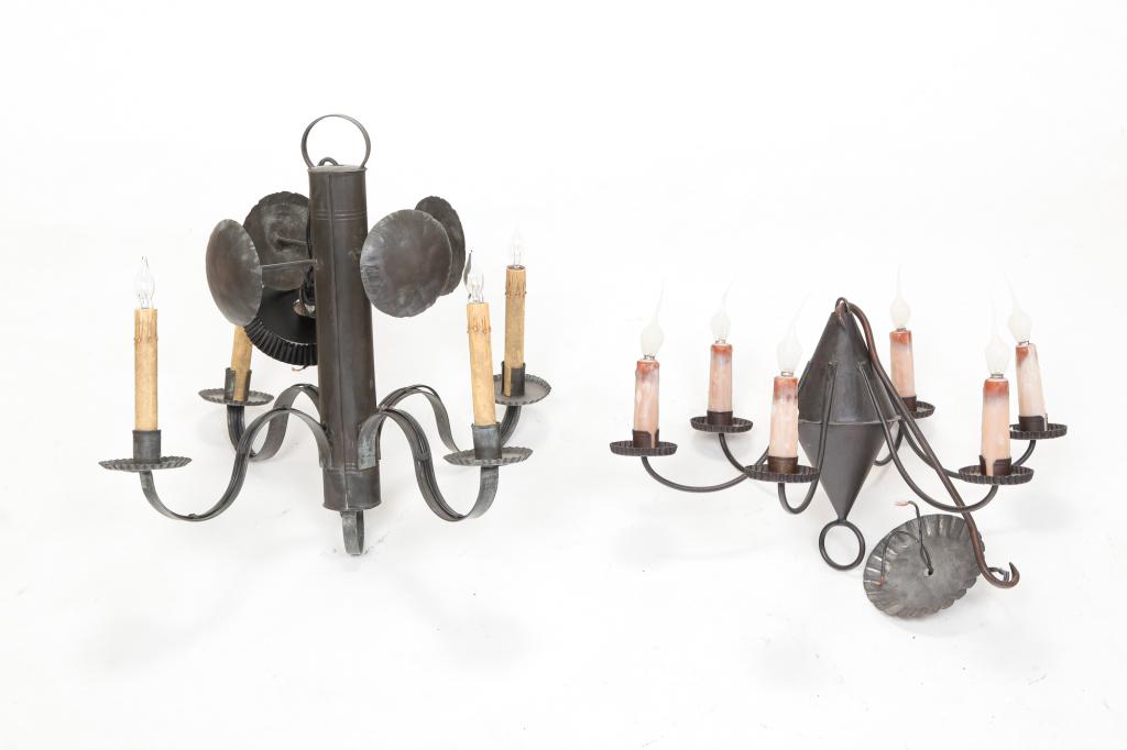 TWO EARLY AMERICAN PERIOD STYLE TIN CHANDELIERS.: Late 20th century. In the 18th century style. Tubular center, reflectors and four lights. 18"h. 22"dia. and six curved arms with "Jim-Buoy" shaped center. 12"h. 19"dia.