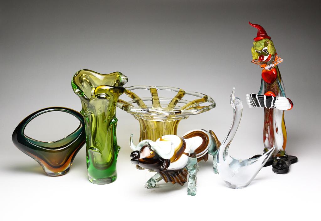SIX ITALIAN GLASS DECORATIVE PIECES.: Second half 20th century. Three vases, 12.5", 9", 8.5"h. The basket shaped vase has a "Made in Italy" paper sticker (small bruise on handle). Together with a clown, 17"h., bull, 7.5"h. and swan with p