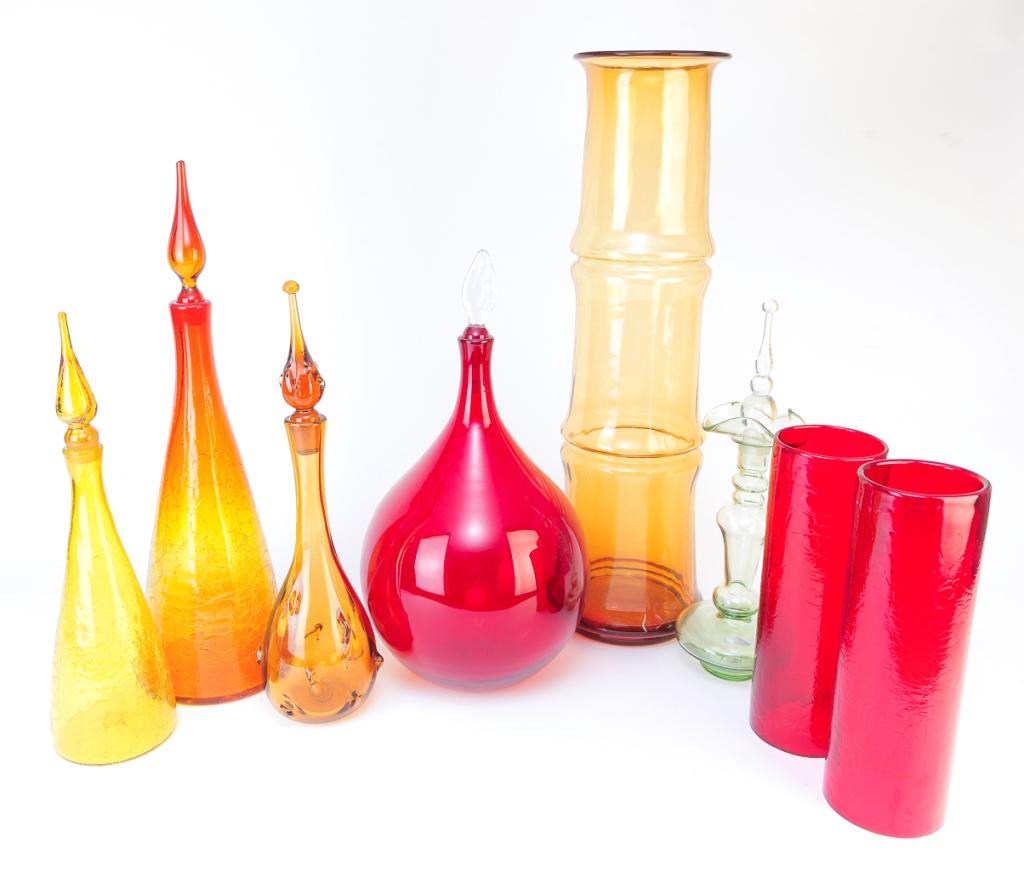 EIGHT LARGE PIECES OF AMERICAN BLENKO GLASS.: Second half 20th century. Amber vase with horizontal ribs, 26"h., pair of ruby crackle glass candle shades, 12"h. and five stoppered decanters. Bulbous ruby, 19"h., crackle amberina, 22"h., crackle am
