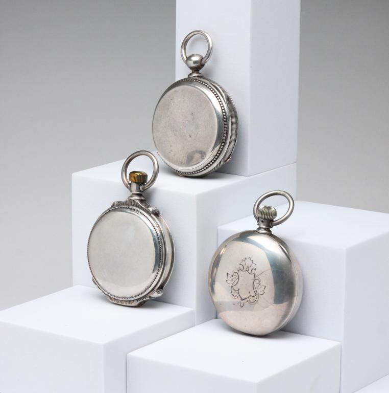 THREE OPEN FACE COIN SILVER POCKET WATCHES.: Fourth Qtr - 19th century. Three Columbus Watch Co. OF, 18S watches including: KW & S, 7J, gilded movement, serial #21174 (1882); KW & S, 15J, Dueber coin case, serial #100162 (1888-89), thick beveled
