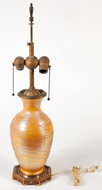 AMERICAN DURAND ART GLASS TABLE LAMP.: First half 20th century. Unsigned, white with gold iridizing and threading, gilded white metal fittings marked "M.S. & Co. Des. Pat # 0154." Some threading loss. 26"h.