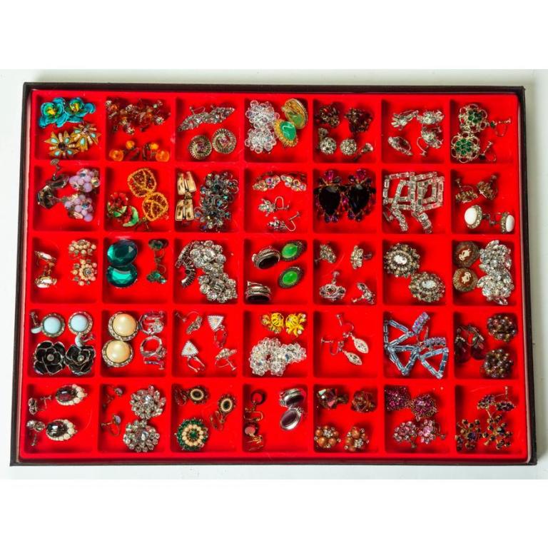 LARGE COLLECTION OF MOSTLY MID-CENTURY EARRINGS.: Sixty-six pairs of earrings, clip-on and screwbacks. Outstanding variety of colored rhinestones, faux pearls, enamel and more. Signed pieces include Kramer, Weiss, Art, Lisner, Hobe, Coro, Trifari, an
