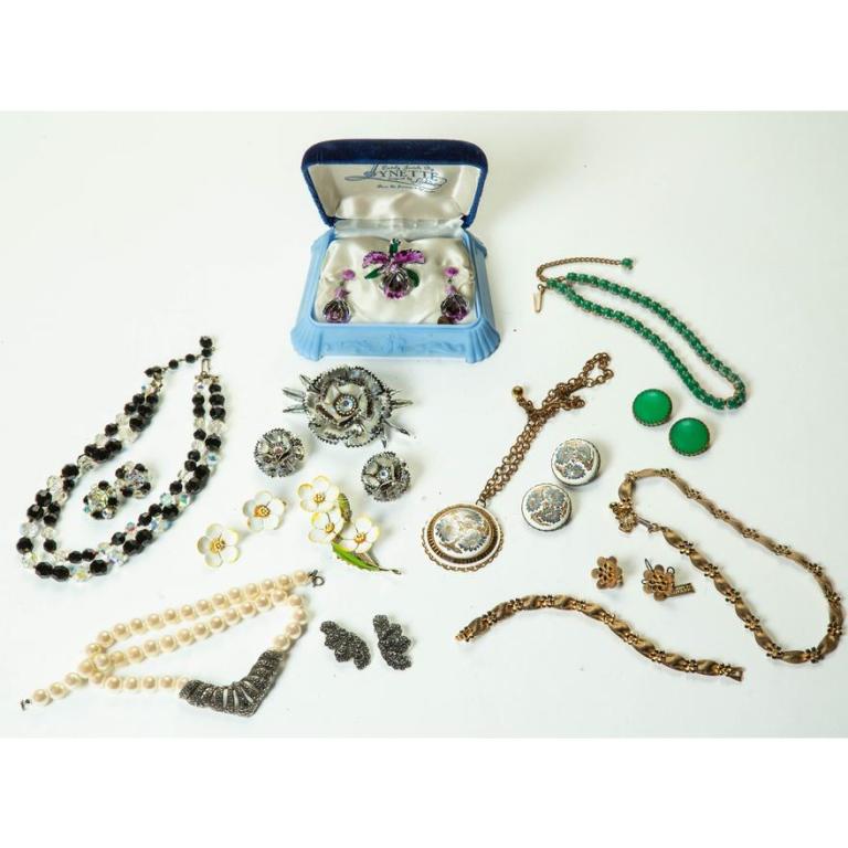 EIGHTS SETS OF VINTAGE COSTUME JEWELRY.: American, W. Germany, mid-century. Sets include Trifari necklace, earrings and bracelet, original tags; Jewels by Lynette designed by Richard pin and earrings, original box; some with crystals, faux p