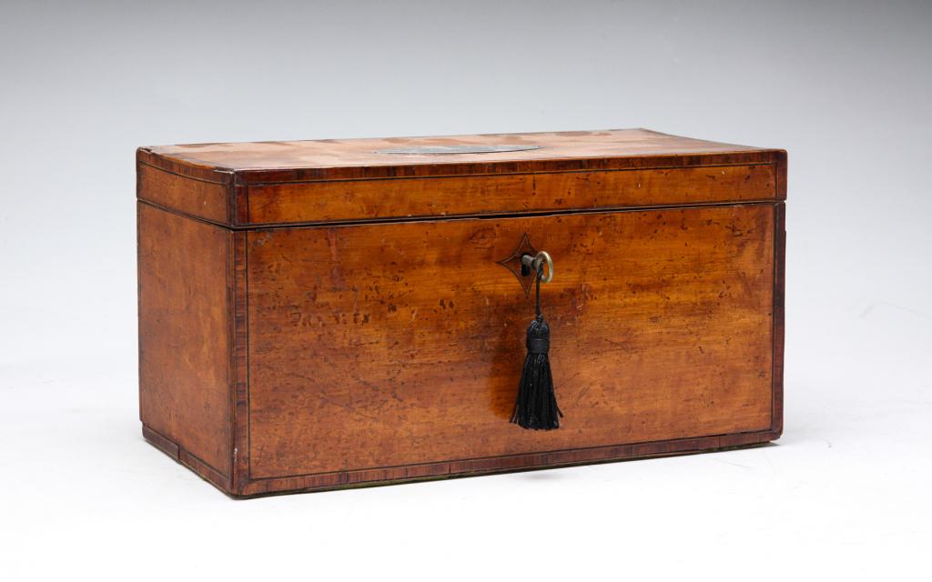 AMERICAN INLAID TEA CADDY.: Early 19th century, birch veneer. Three compartments with bird's-eye veneer lids. Lid has interior impressed and painted monogram and monogrammed silver plaque on top. Includes spoon with faux hallmar