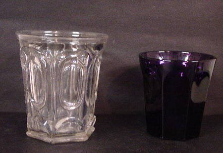 TWO TUMBLERS. Pittsburgh amethyst panel.: TWO TUMBLERS. Pittsburgh amethyst panel. Good color. 3 1/4"h. And clear flint in a loop variant. Roughness and flakes. 4"h.