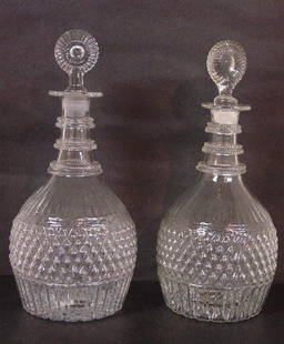 PAIR OF 3-MOLD GLASS DECANTERS. GII-8 wi: PAIR OF 3-MOLD GLASS DECANTERS. GII-8 with applied double rigaree rings on the neck. Some residue in one. 8"h. plus mismatched stoppers.