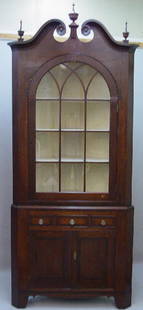 TRANSITIONAL TWO-PIECE CORNER CUPBOARD W: TRANSITIONAL TWO-PIECE CORNER CUPBOARD WITH INLAY. Hepplewhite with some Chippendale characteristics. Cherry with a dark refinishing. Pine and poplar secondary woods. Bracket feet with band inlay