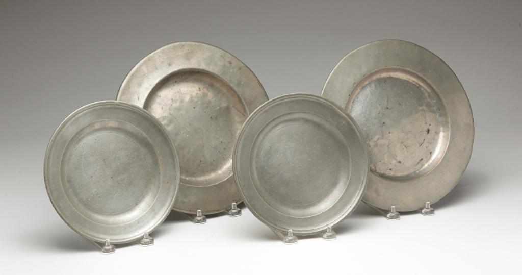 FOUR ENGLISH PEWTER PLATES. (1 of 6)