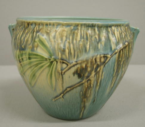 ROSEVILLE MOSS HANDLED BOWL. Ivory to blue glaze.