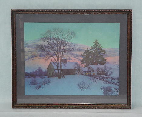 TWO FRAMED BROWN & BIGALOW CALENDAR MAXFIELD PARR: TWO FRAMED BROWN & BIGALOW CALENDAR MAXFIELD PARRISH PRINTS. 'A New Day' depicts snow covered homestead at dawn. 11 1/2"h. 13 5/8"w. 'Lights of Welcome' has yellow moon rising over home and trees. 14"