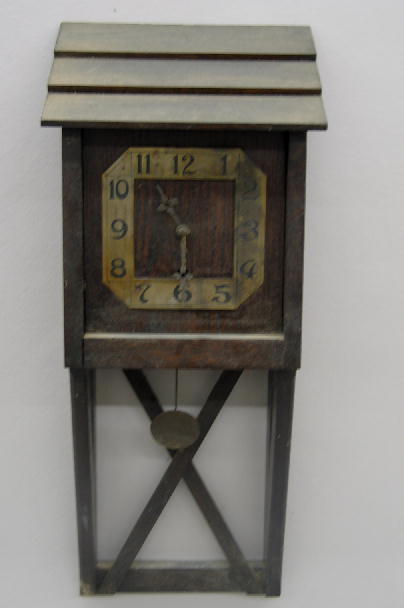 ARTS & CRAFTS WALL CLOCK. Oak with the original d