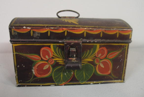 SMALL TOLE DOME TOP DOCUMENT BOX. Original red, gr: SMALL TOLE DOME TOP DOCUMENT BOX. Original red, green and yellow floral decoration with swags over golden brown japanning. Tin hasp and wire handle. Minor flaking. 6 1/4"w. 2 3/4"d. 3 5/8"h.