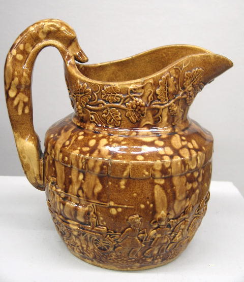 ROCKINGHAM HOUND HANDLE PITCHER. Relief design of