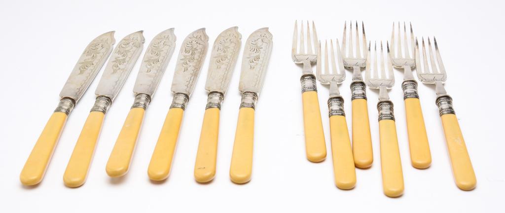 ENGLISH CELLULOID HANDLE FISH SERVICE FLATWARE. (1 of 5)