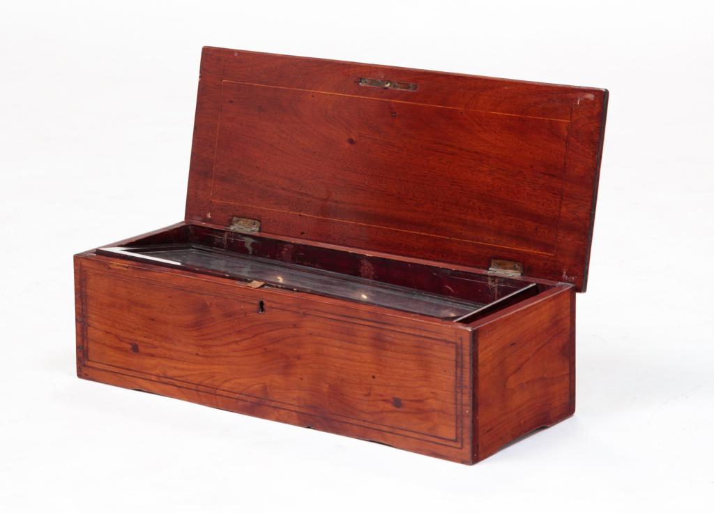 CYLINDER MUSIC BOX IN INLAID CASE.: Fourth quarter 19th century. Swiss movement. Needs mechanical work, missing teeth. 19"w. 5.5"h. 7.75"d.