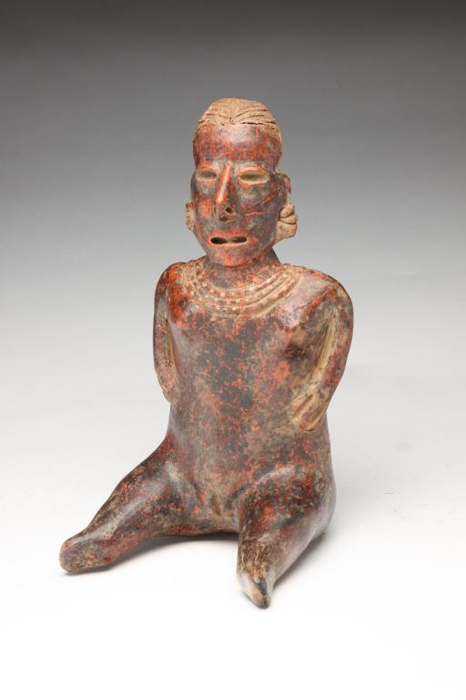 REPRODUCTION PRE-COLUMBIAN FEMALE STATUE. (1 of 4)
