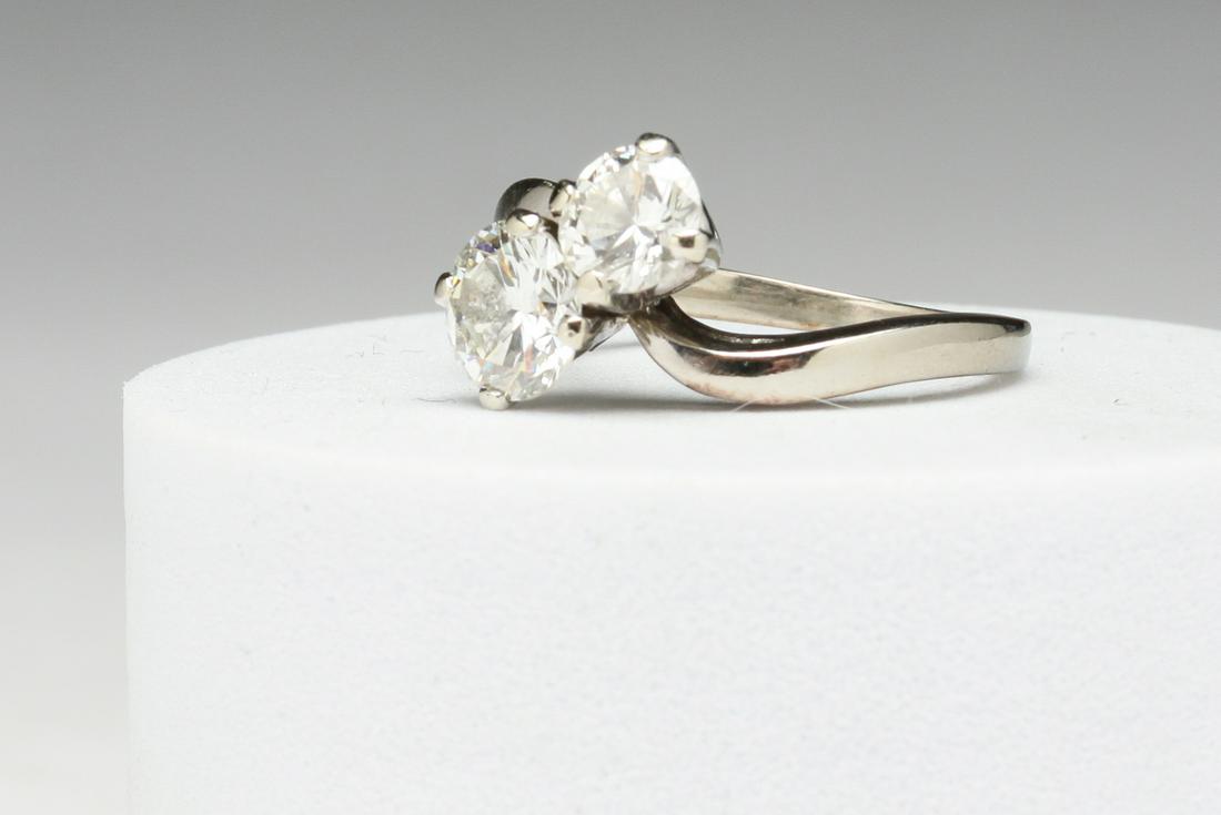 14 KARAT TWO-STONE DIAMOND BYPASS RING. (1 of 3)