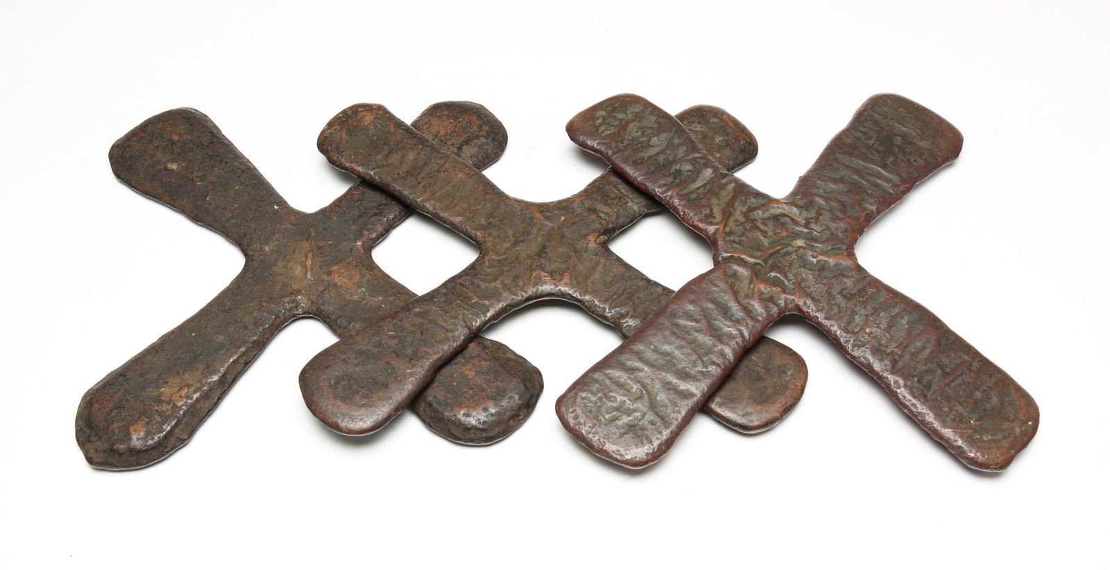 THREE AFRICAN CROSS CURRENCY PIECES. (1 of 3)