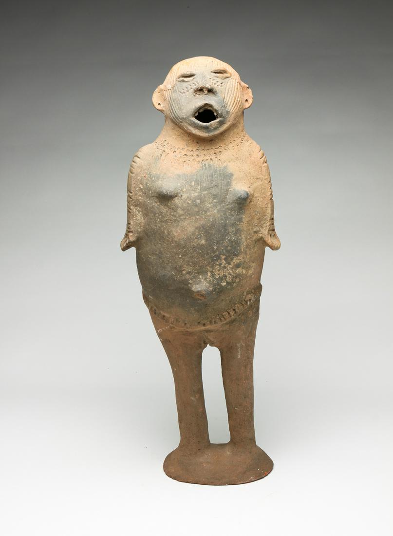 AFRICAN POTTERY MOURNING FIGURE. (1 of 4)