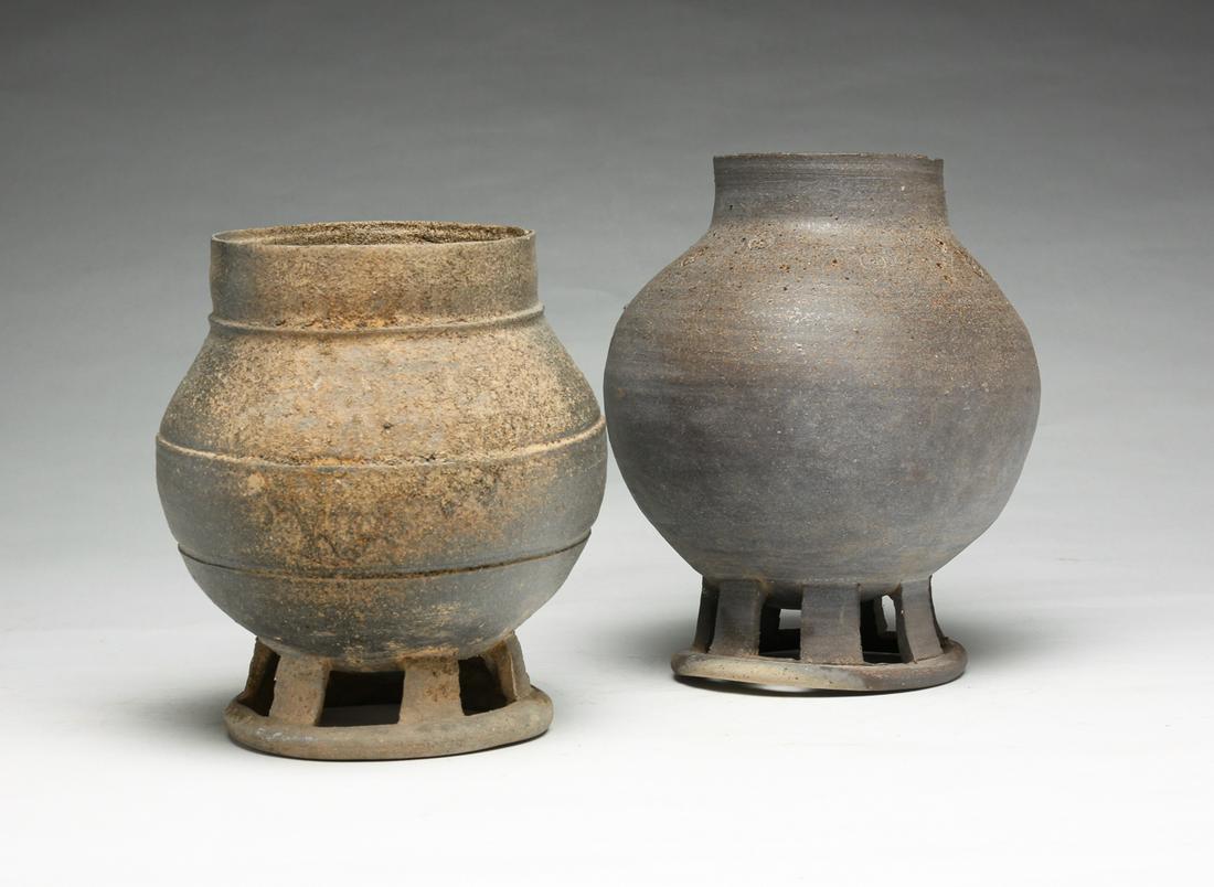 TWO KOREAN SILLA POTTERY FOOTED VESSELS. (1 of 4)