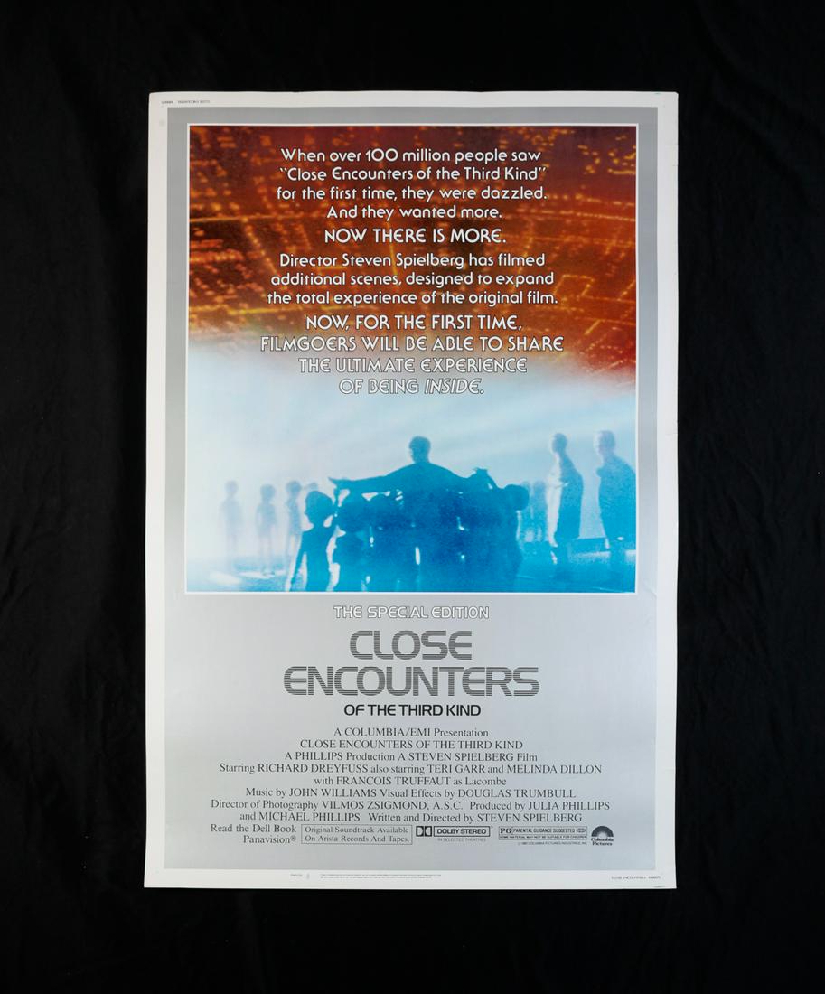 CLOSE ENCOUNTERS OF THE THIRD KIND (R-1980).: Columbia/EMI. Original 40" x 60" movie poster, rolled. Few tears to edges and slight fading.