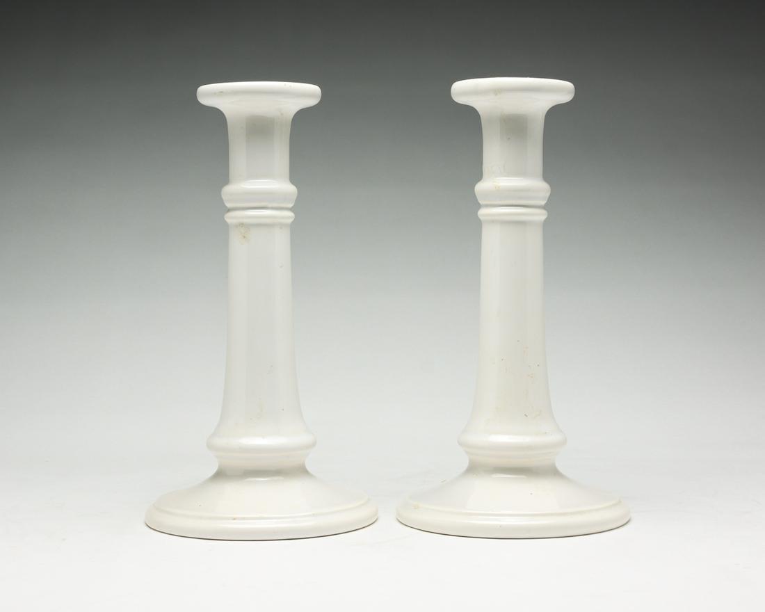 A PAIR OF AMERICAN HAEGAR CANDLESTICKS.: Mid 20th century. Mold number 3045, slip cast with high glaze. 10"h.