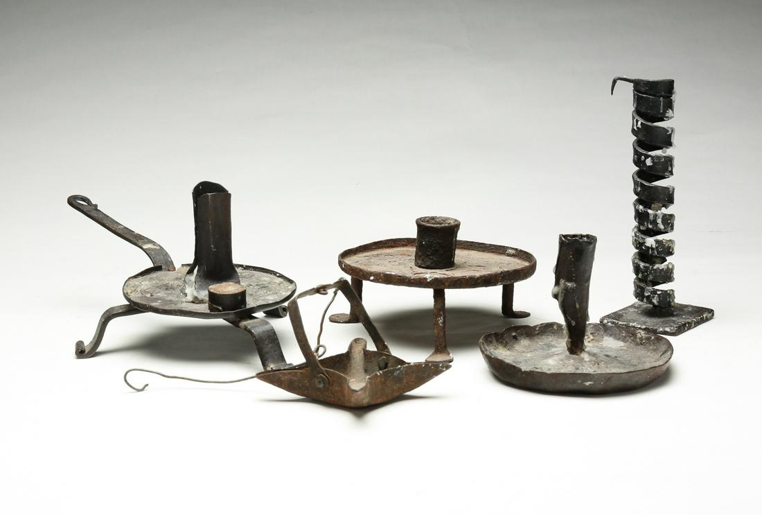FIVE AMERICAN WROUGHT IRON LIGHTING DEVICES. (1 of 3)