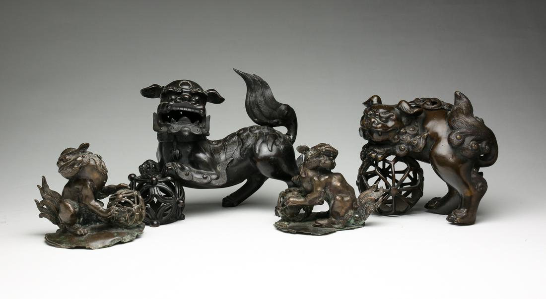 FOUR CHINESE BRONZE FOO DOGS. (1 of 5)
