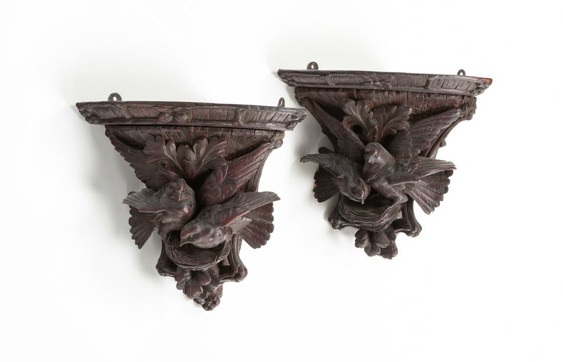 A PAIR OF GERMAN BLACK FOREST CORNER SHELVES. (1 of 4)