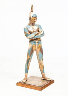 AMERICAN MARBRO LAMP COMPANY HARLEQUIN.: Second half-20th century. After the bronze St. Marceaux, 1879. Resin, painted in cream, blue and gilt. 38"h.