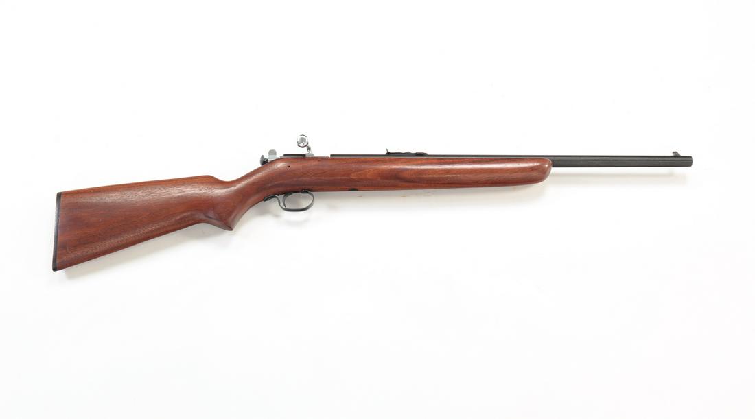 WINCHESTER MODEL 67 .22 BOLT ACTION RIFLE: Winchester Model 67 .22 bolt action rifle. Walnut stock with blued barrel. 20" barrel length, 35" overall. Possibly unfired. Requires ATF form 4473.