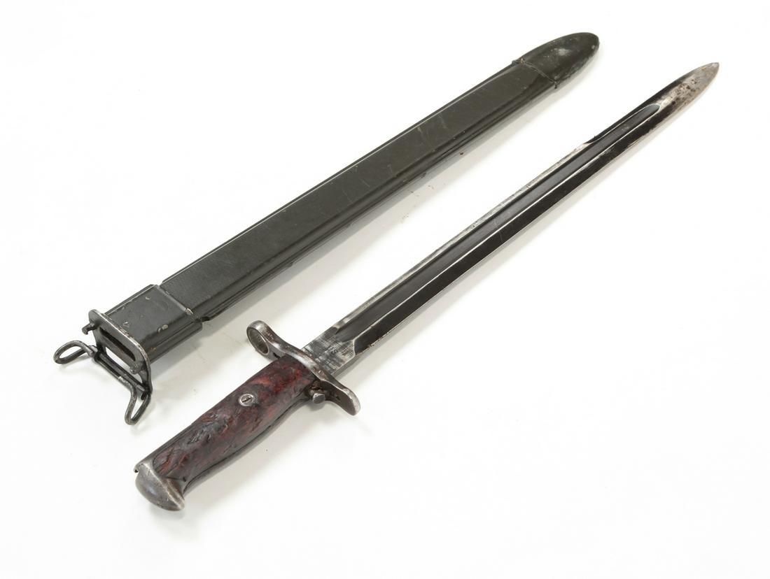 1912 ROCK ISLAND ARSENAL BAYONET WITH SCABBARD: 1912 Rock Island Arsenal bayonet with scabbard. Wooden handle. 15-7/8" blade length, 20-1/2" overall.