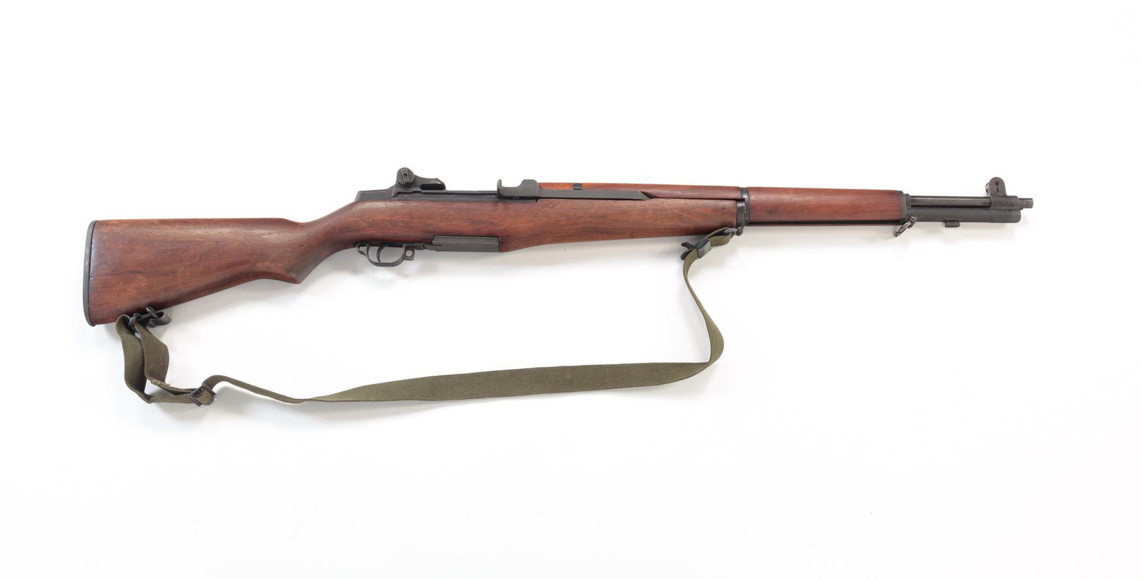 U.S. SPRINGFIELD M1 GARAND .30-06 SEMI AUTO RIFLE: U.S. Springfield M1 Garand .30-06 semi automatic rifle. Walnut stock with faint cartouche on underside of grip. 24" barrel length, 43-1/2" overall. Serial number 1426598. Requires ATF form 4473.