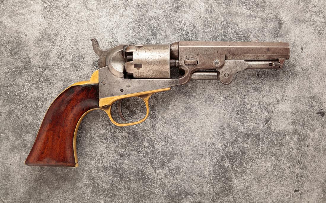 COLT 1849 POCKET .31 CALIBER SA REVOLVER: Colt 1849 pocket single action .31 caliber revolver. Smooth walnut grips with steel frame, brass trigger guard and back strap. 4" barrel length, 9" overall. Serial number 321725.