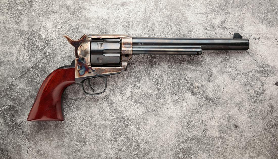 UBERTI CATTLEMAN .45 LONG COLT SA REVOLVER: Uberti Cattleman .45 long colt single action revolver. Smooth walnut grips with blued frame, barrel and fluted cylinder. 7-1/2" barrel length, 13" overall. Serial number J91429. Includes original box 
